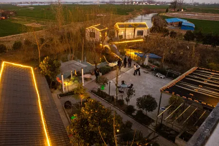 Jieshou Farm House Отели в г. Цзешоу