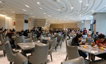 The dining room at a person's location in Paris is spacious and well-appointed at MagTree Genting Highlands