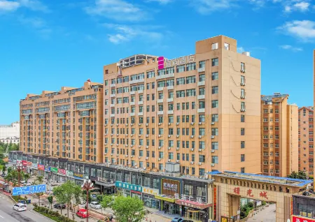 Echarm Hotel (Dongming Bus Station Shuguang Road Branch) Отели в г. Дунмин