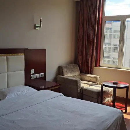 Fugu Xinmin Derong Hotel