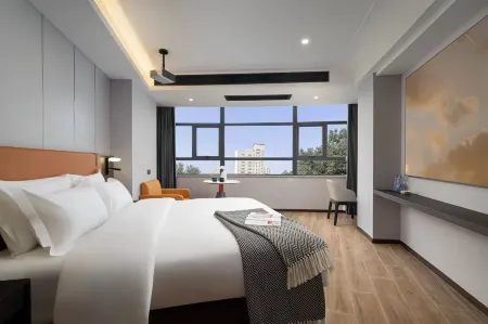 TOWO Shangpin Hotel (Zhuzhou Railway Station Clothing Market Wholesale Branch) Отели рядом с достопримечательностью «Hunan Automobile Engineering Vocational College (New Campus)»