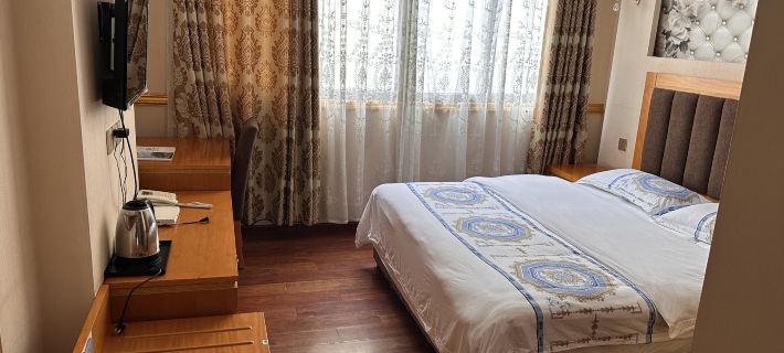 Xinlong Jinqiu Color Hotel Hotels in Xinlong