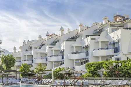 Sahara Sunset Club Отели рядом с достопримечательностью «Памятник Коломаресу»