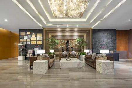 Olympic Mingdu International Hotel Отели рядом с достопримечательностью «China Dinosaur Land»