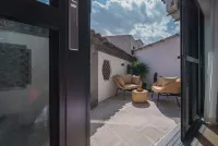 Qiwu Homestay (Jianshui Ancient City Small Train Branch) 오룡호 도시공원 주변 호텔