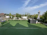 Qufu Liren Residential Residence (Sankong Scenic Area Shop) โรงแรมใกล้CPC Qufu Committee Party School