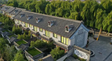 Fuzi Binshe Family Education Culture Boutique Hotel Отели рядом с достопримечательностью «WuMaCi Jie»