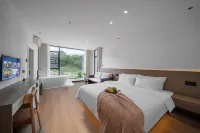 Ruomengyunyuan B&B (Libo Xiaoqikong Scenic Area East Gate) - ที่มีอ่างอาบน้ำ