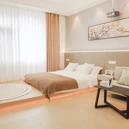 Aiqing Apartment Отели рядом с достопримечательностью «Большой рынок для общины»