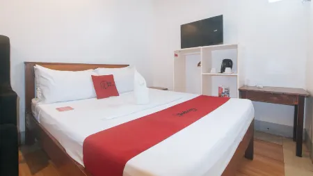 RedDoorz @ Lualhati Garden Cottage El Nido Palawan Отели рядом с достопримечательностью «Парадайс Бич»