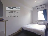 &and Hostel Minamisenju