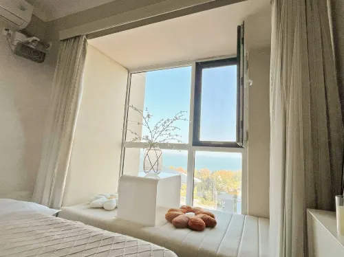 Fengzhiyu Homestay (Weihai Park Wanda Plaza)