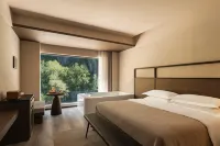 Jiuzhaigou · Mistshroud Mountains & Sunset Glow Snowscape · Sukoon Village Hotels in Jiuzhaigou