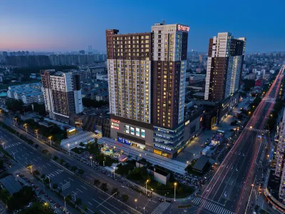 Suju Service Apartment (Shanghai International Tourism and Resorts Zone Zhoupu Wanda) فنادق في 