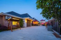 Flower Hotel Yiding Country House Homestay Hotels near Shanghai Chongming High School Gymnasium