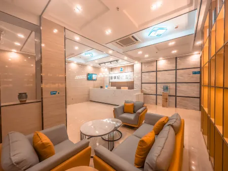 Xingxiang Light Luxury Hotel (Binyang Department Store) Отели рядом с достопримечательностью «Binyang Gymnasium»