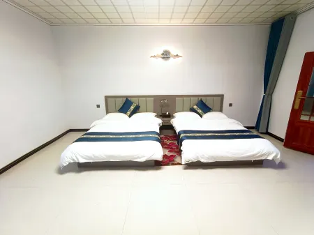 Juyuanminsu Отели рядом с достопримечательностью «Laolongtan»