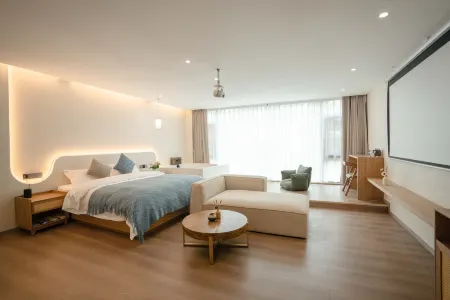 Maitreya Guisu Homestay Отели рядом с достопримечательностью «Honghe Nativeland»