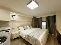 Xingyue Light Luxury Audio-Visual Homestay (Haiyan Wuyue Plaza Branch) - ห้องครัว