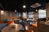 โรงแรมเยว่เฟิง (สถานีขนส่งหยางเจียง วอลมาร์ท) - พร้อมอาหารเช้า