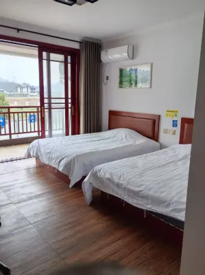A Rest in Xinchang Hotels near gui hua mu di zhi yi ji