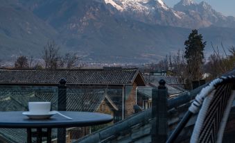 Beizunlinka · Golden Light on the Snow Mountain | Shiguang Buyu · Snow Mountain Panoramic View Hotel