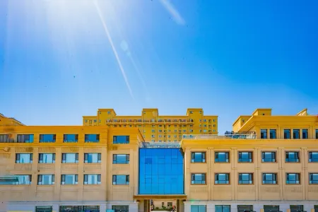 Yikeju Hotel (Yining City Railway Station) Отели рядом с достопримечательностью «Ili Normal University»