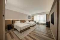 Meihao Lizhi Hotel (Guangzhou Xintang High-speed Railway Station Branch) - พร้อมอาหารเช้า