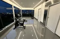 Huanman Qiancheng Elite · Aesthetic Luxury Hotel (Huaguoyuan White‑House Art Center, Guiyang) - Phòng Gym