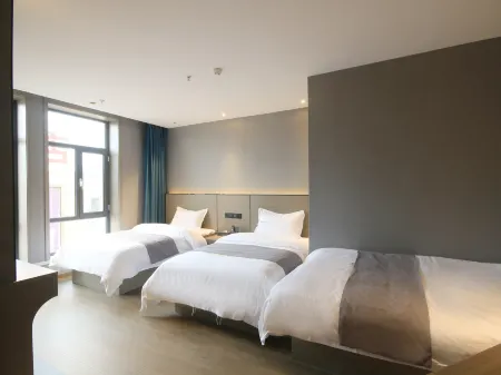 Lilai Fashion Holiday Hotel (Baiyin Jingyuan High-speed Railway Station) Отели рядом с достопримечательностью «Zhonggulou»