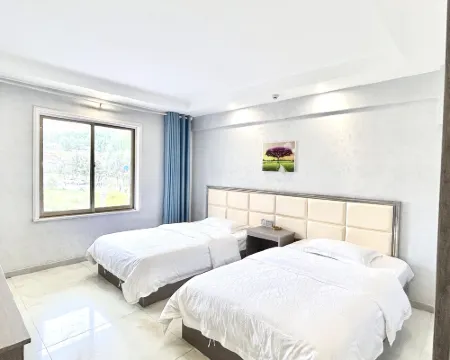 粛南ユグル族自治県裕鑫ビジネスホテル 粛南ユグル族自治県のホテル