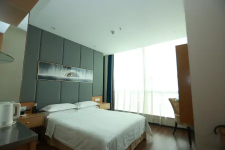 Fugu Xingmao Hotel Отели рядом с достопримечательностью «Fugu County Taikoo Li»