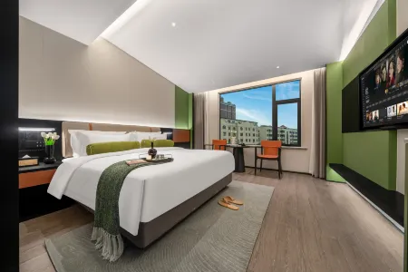 Huanyu Hotel Отели рядом с достопримечательностью «Kaifeng Gulou Plaza»