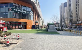 Zhuohang Homestay (Qingdao Shimao 52 Shopping Center)