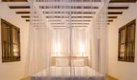 Cinnamon House by the Serendipity Collection