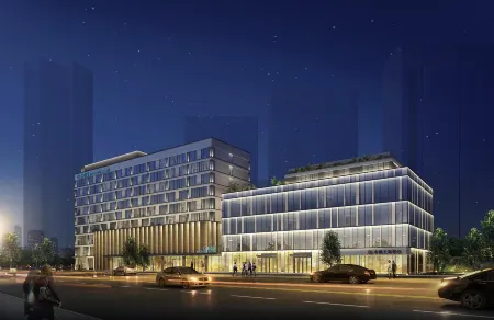  Xinzhuo Hotel (fashion city west of Wenzhou) Отели рядом с достопримечательностью «Luzhong Ancient Tree»