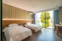 Fanyun Qingju Apartment Hotel (Dazu Longshui Bus Station) Hotels near Aijia Ancestral Hall