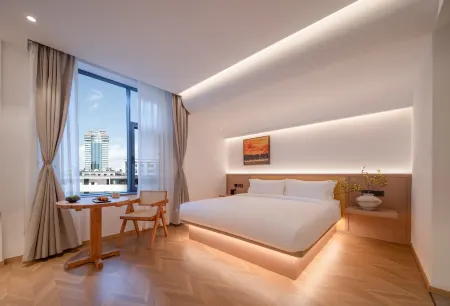 Kunming Old Street Wanda Moments Retreat Отели рядом с достопримечательностью «Southwest Forestry University Bailong Campus»