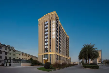 Ouyin Hotel (Yongning Park Wuyue Shopping) Отели рядом с достопримечательностью «Taizhou Vocational College Of Science & Technology»