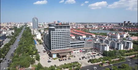 Huayue Triumph Hotel Huanghua Отели рядом с достопримечательностью «Bohai Polytechnic Vocational College»
