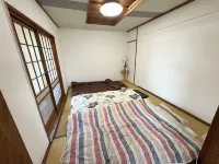 Kikai Island Rakuraku Stay “Room 201” – Retro island life in a tropical nostalgic apartment. Hotels in Kikai