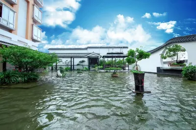 First Mountain Stream-Suiju Hotel (Qingyun Road Guomao Yitiancheng Shopping Centre) Отели в г. Железнодорожная станция