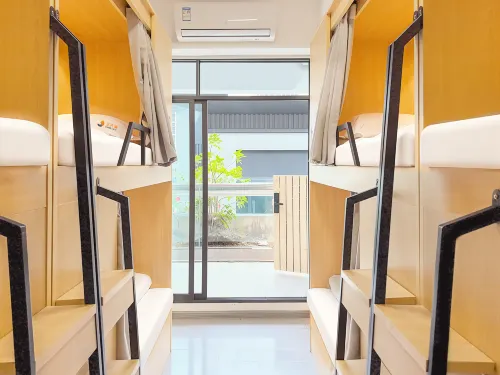 Three Cats Youth Hostel (Meishan Renshou Xixili Store）