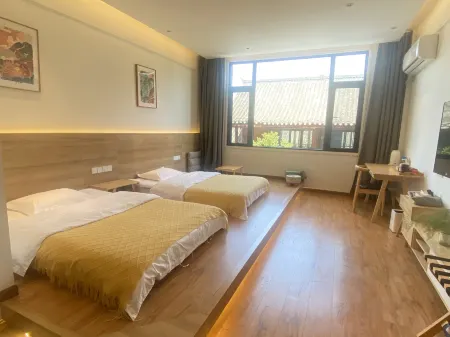 Taoyuan Xishe Homestay (Taohuayuan Scenic Area) Отели в г. Таоюань