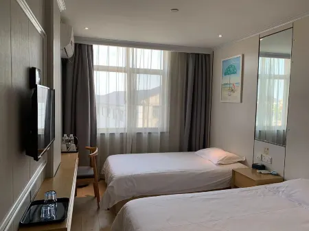 100 Inn Liangpin Hotel (Shanghai Fengxian Situan) Отели рядом с достопримечательностью «Shanghai Technical Institute of Electronics & Information»