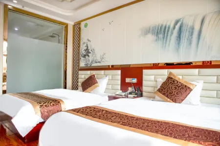 Lvchun Green East Business Hotel Отели в г. Lvchun