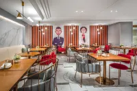 Magnotel Hotel (Dongxing Guomen Port) - servizio colazione