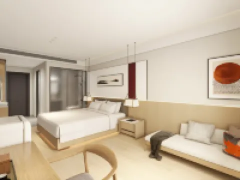 Xinxiang Zimu Hotel (Baolong Plaza)