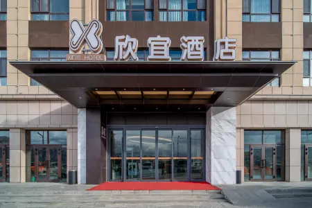 Xinyi Hotel Отели в г. Ташкурган