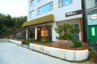 Shennongjia Langlang Mountain Parent Child Homestay Hotel a Songbai commercial street/Songbai town bus station